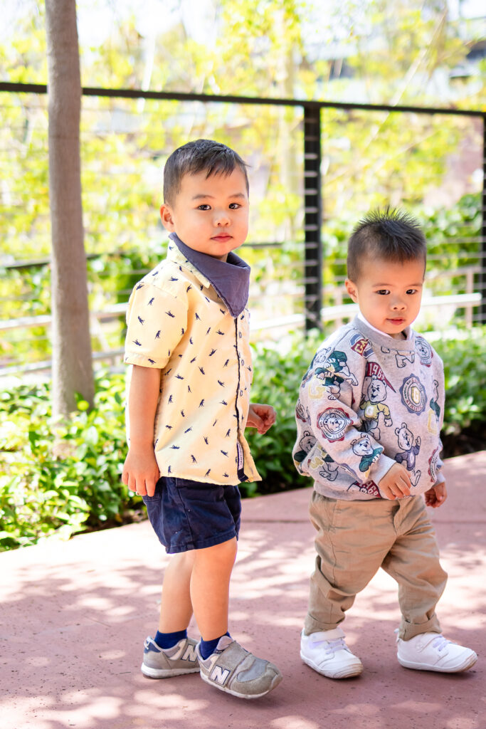 Joyful toddler exploring outdoors during a relaxed lifestyle family photoshoot