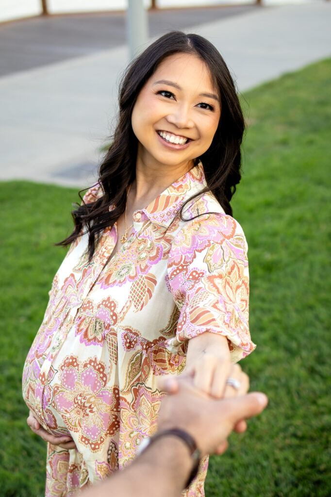Close-up of smiling pregnant woman looking lovingly at her partner