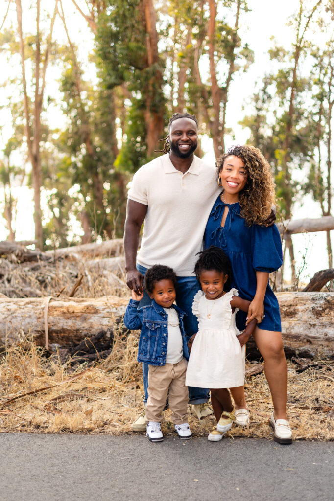 Smiling family portrait outdoors  – Ellobelle Photography