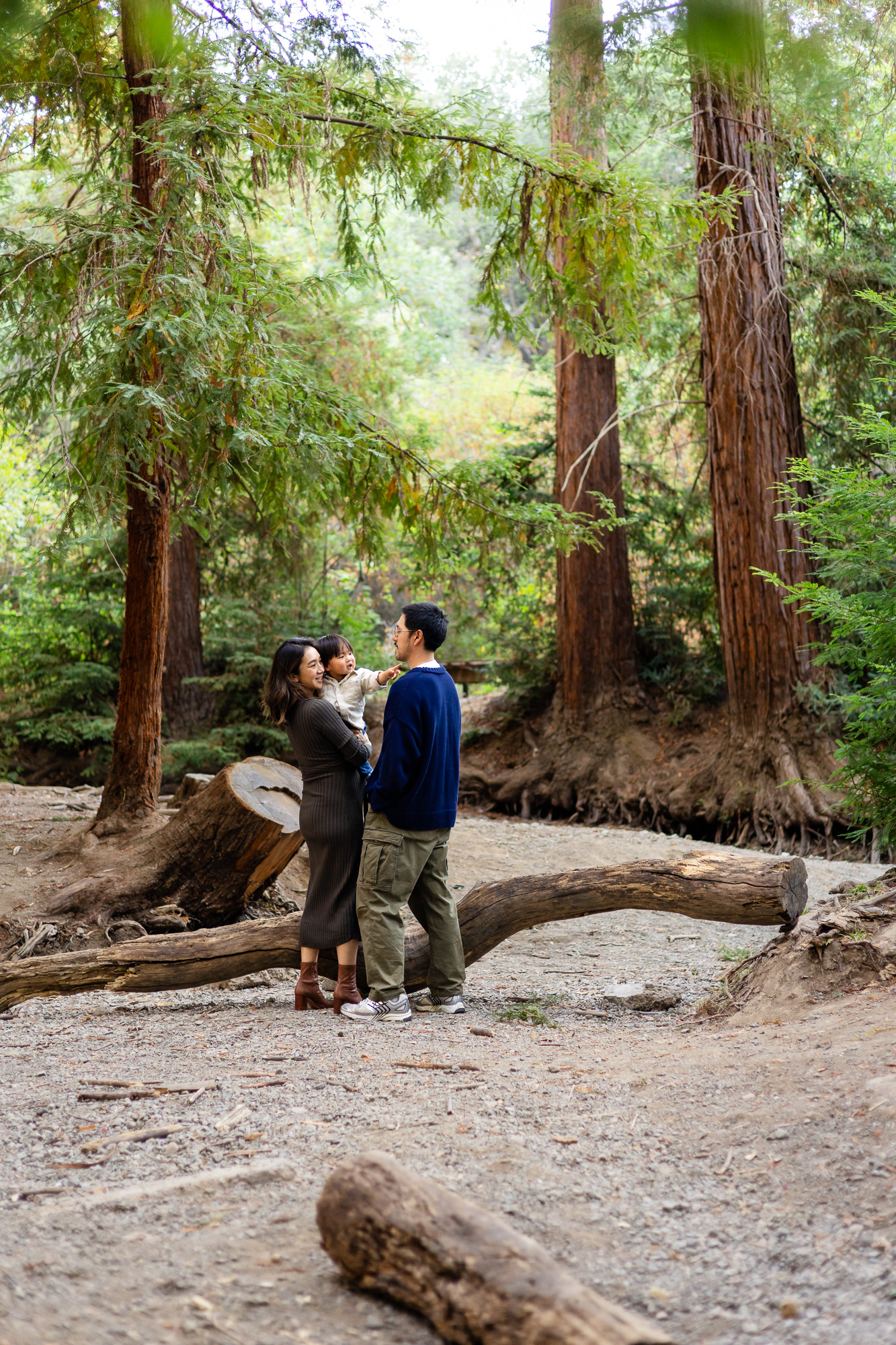 Family standing together under tall trees at Redwood Grove Los Altos – Ellobelle Photography