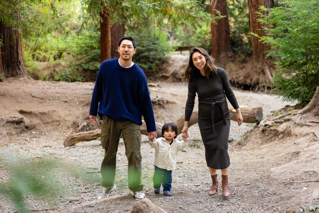 Parents walking hand in hand with child at Redwood Grove Nature Preserve photos – Ellobelle Photography