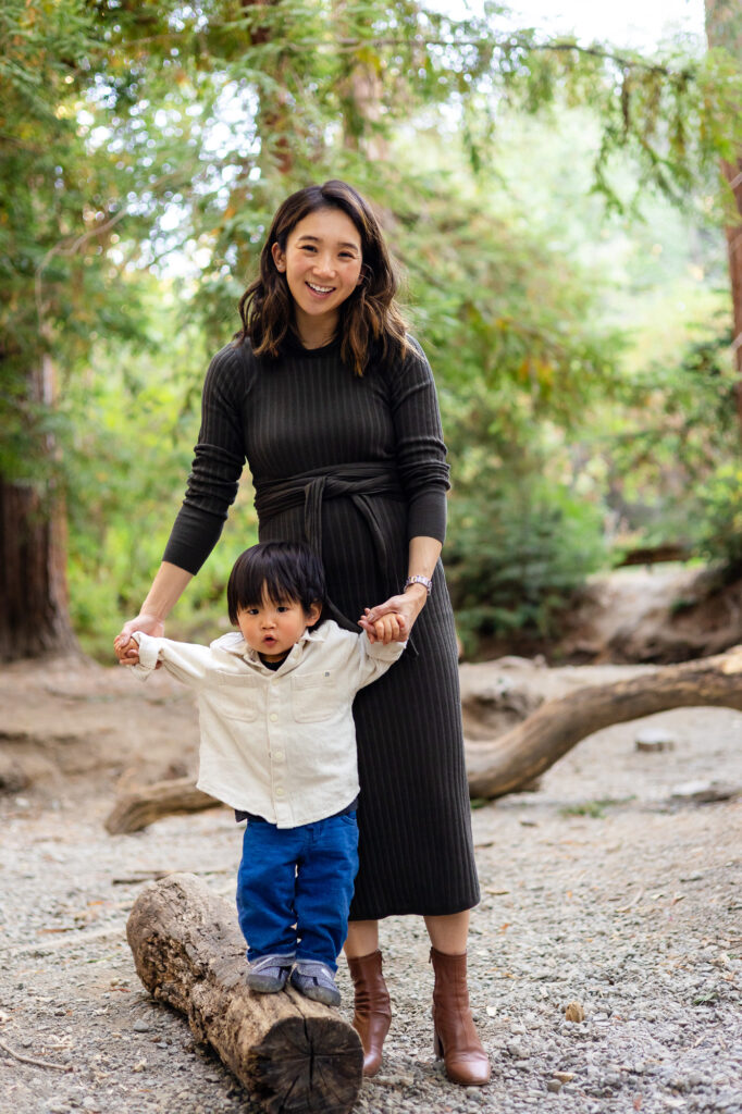 Mother and toddler standing on log at Redwood Grove Los Altos – Ellobelle Photography