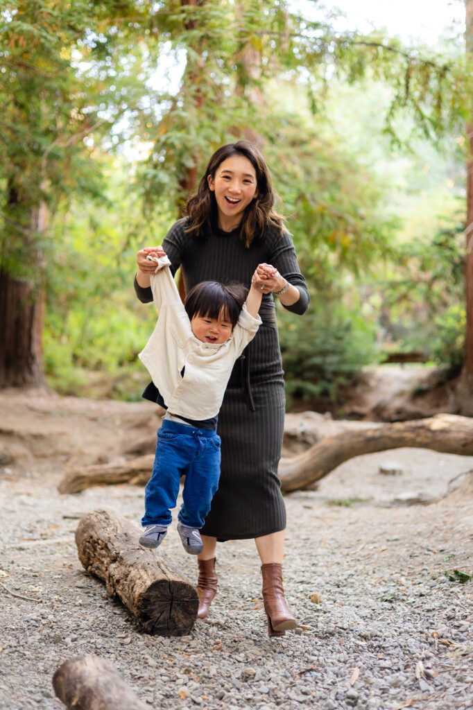 Mom swinging toddler by the arms at Redwood Grove Los Altos – Ellobelle Photography