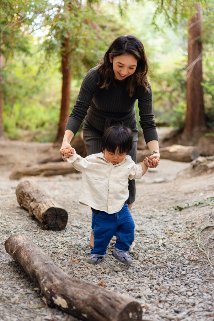 Mother helping toddler walk along forest path at Redwood Grove Nature Preserve photos – Ellobelle Photography