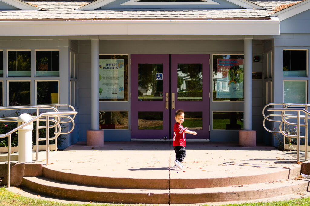 Child outside Village Park Preschool in Burlingame – Ellobelle Photography