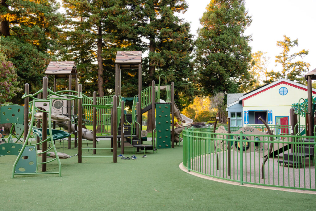 Full view of Village Park Playground Burlingame near red-roofed building – Ellobelle Photography