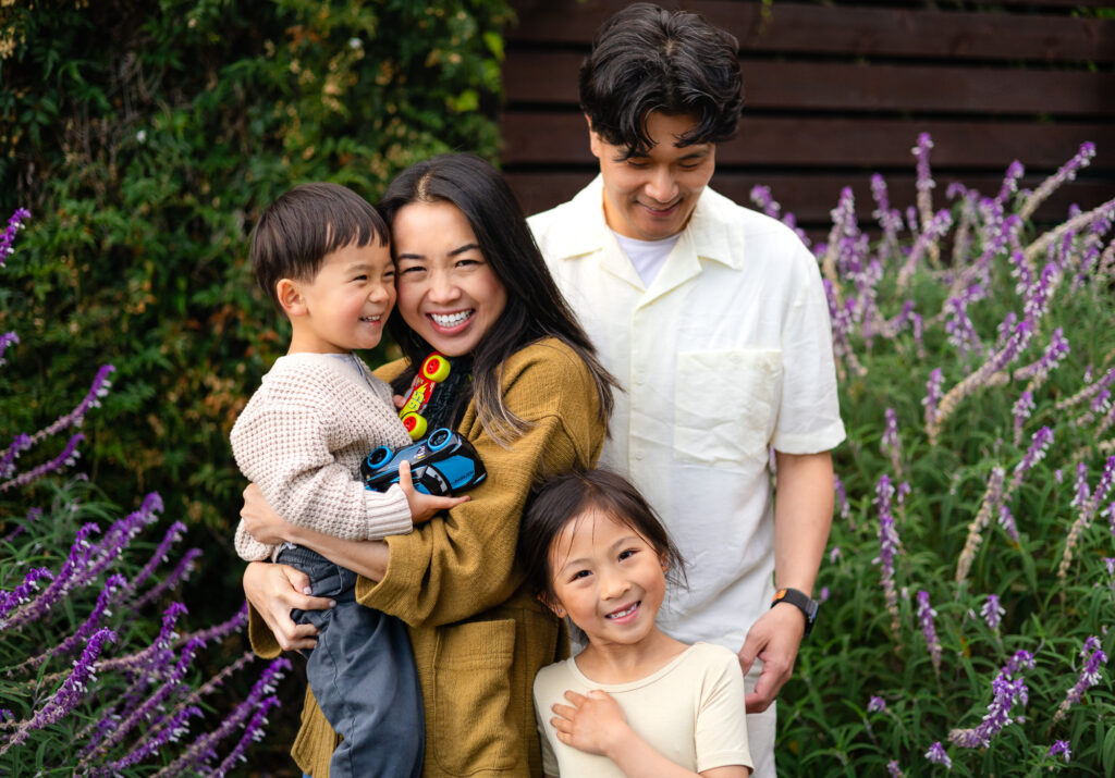 Family laughing together in the flowers – Ellobelle Photography