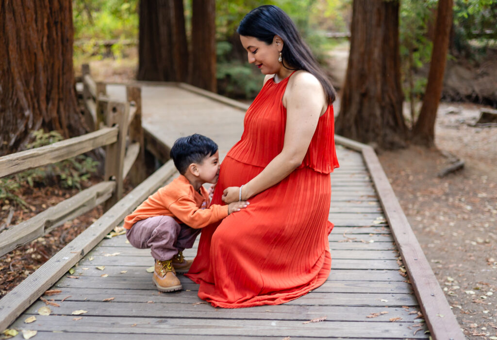 Little boy kissing his mom’s baby bump during a Bay Area maternity session – Ellobelle Photography