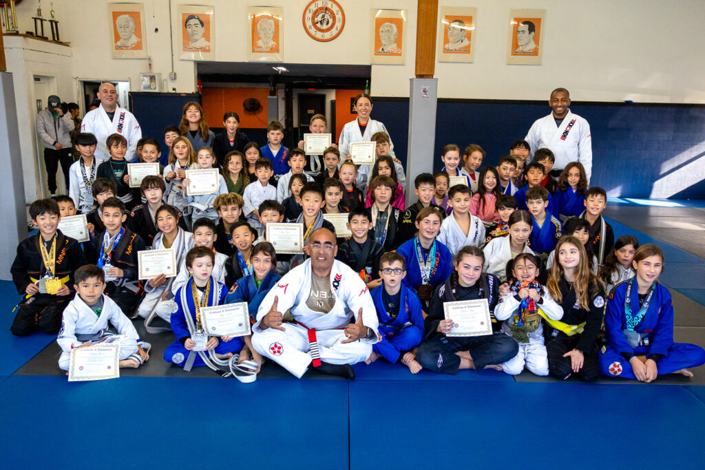 Large group of kids and instructors at MNBJJ