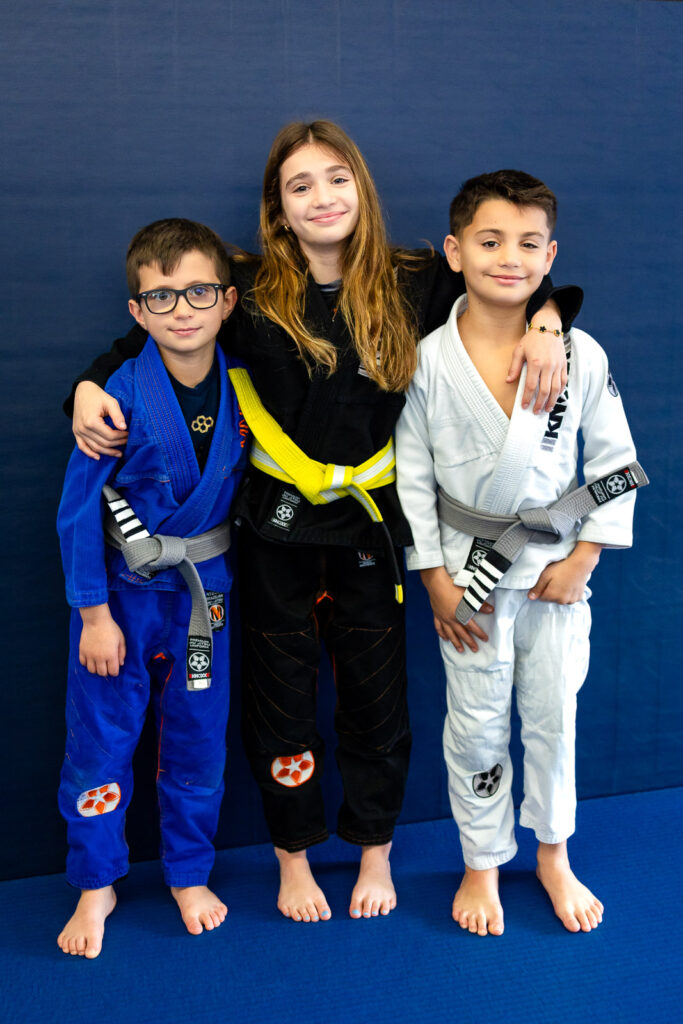 Young athlete with multiple medals at Marco Nascimento in San Mateo