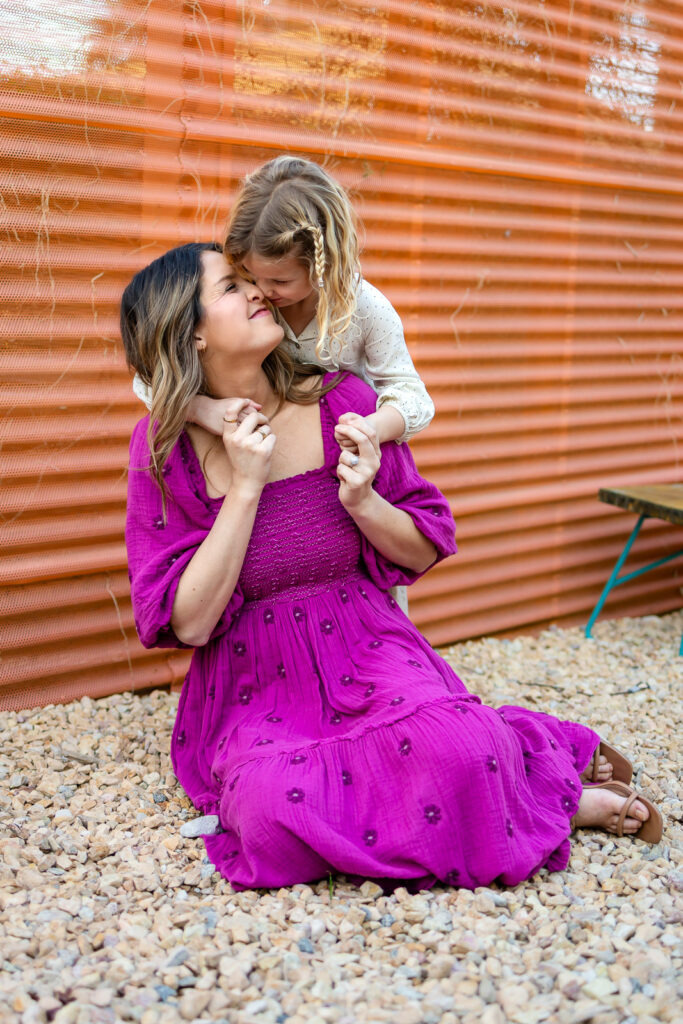 Mother and daughter relaxing together during Palo Alto motherhood photos natural connection portrait