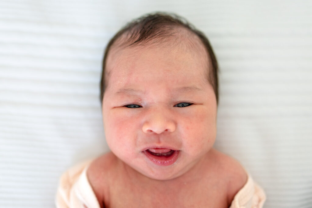 An honest look at a lifestyle newborn session on the SF Peninsula, demonstrating how beautiful images only require one window of natural light and a comfortable space.