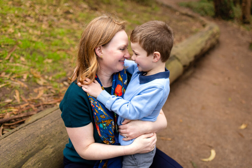 A mother and son sharing a connected hug during a session with a San Francisco family photographer.