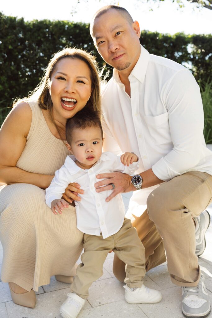 Ellen Lai with her husband and son during a golden hour family portrait session in the San Francisco Bay Area