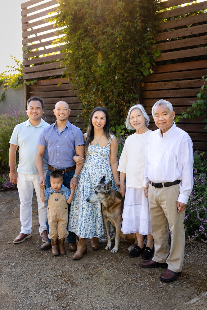 Three-generation extended family pictures with grandparents, grandchildren, parents, and family dog in Burlingame